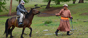 Horse riding in central part of Mongolia
